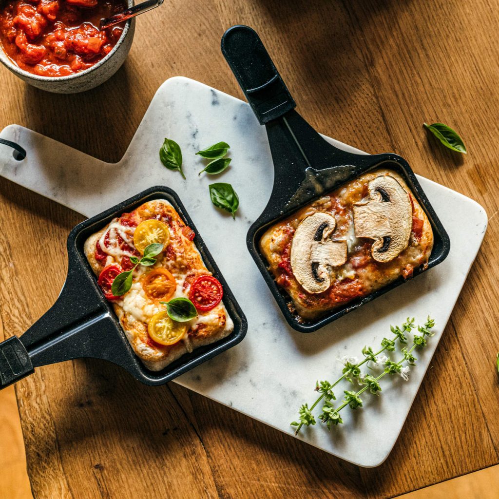 Pizza Raclette RCP 1800 vom Rommelsbacher macht macht einfach leckere Pfännchen.
