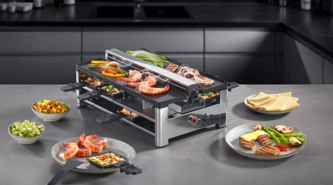 Genuss ohne störende Gerüche: Der Raclette AirClean macht´s möglich – dank integriertem Dunstabzug auf zwei Ebenen (obere Grillplatte und untere Raclette-Ebene)